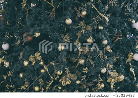 Christmas fir tree with golden decorations, balls, background, texture Christmas fir tree with golden decorations, balls, background, texture 55029488