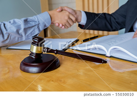 Business confident handshake and business people Business confident handshake and business people 55030010