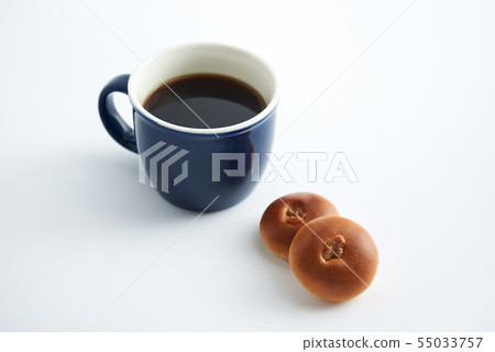 Coffee and Anpan bread on a white background. Coffee and Anpan bread on a white background. 55033757