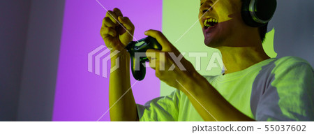 [Image of e-Sports] A scene where pro gamers are exciting at the game festival (no face) 55037602