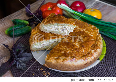 Homemade cheese onion pie with vegetables Homemade cheese onion pie with vegetables 55038207