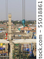 Construction building with construction crane. 55038861