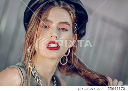 Attractive girl with brown eyes wearing thick accessories Attractive girl with brown eyes wearing thick accessories 55042170