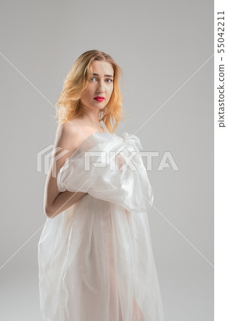 Slim blonde wrapped in white cloth view Slim blonde wrapped in white cloth view 55042211