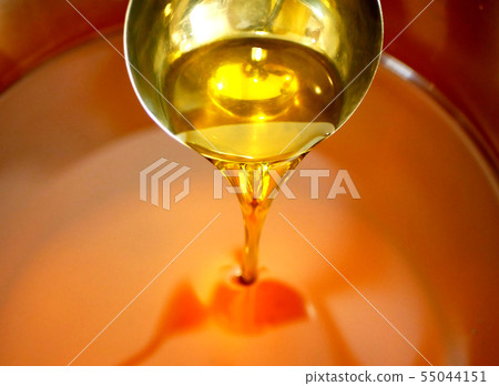 Rapeseed canola oil organic quality bio, bubbles active, mixing and pouring in a steel barrel, for Rapeseed canola oil organic quality bio, bubbles active, mixing and pouring in a steel barrel, for 55044151