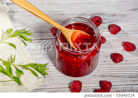 Homemade jam and fresh raspberry Homemade jam and fresh raspberry 55048724