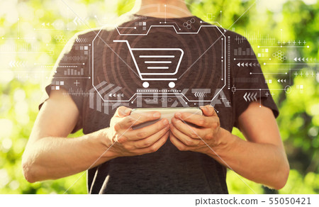 Online shopping theme with man holding his smartphone Online shopping theme with man holding his smartphone 55050421