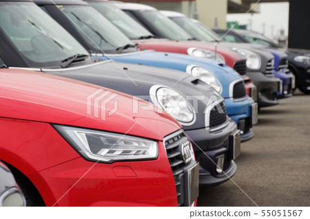 Car imported car lined up with dealerships 55051567