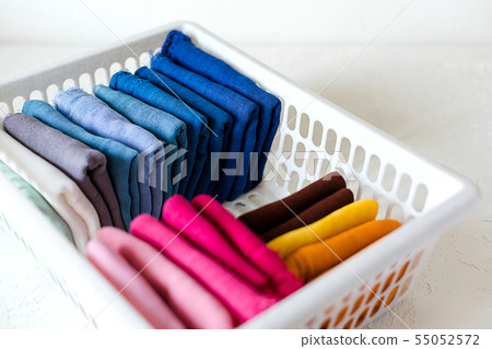 Keeping clothes at the box on white background Keeping clothes at the box on white background 55052572
