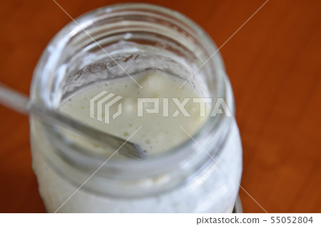 Close-up shot of a glass jar filled with 55052804
