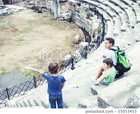 mother with little sons on vacation visiting ancient colosseum, summer tourism, lifestyle people mother with little sons on vacation visiting ancient colosseum, summer tourism, lifestyle people 55053453