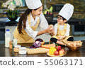 Happy asian family in the kitchen.Mother and son h 55063171