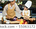 Happy asian family in the kitchen.Mother and son h 55063172
