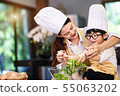 Happy asian family in the kitchen.Mother and son h 55063202