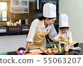 Happy asian family in the kitchen.Mother and son h 55063207