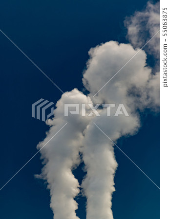 Smoke from pipes of thermal power plant on sunset. Smoke from pipes of thermal power plant on sunset. 55063875