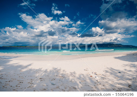 Paradise beach with blue ocean in tropical island 55064196
