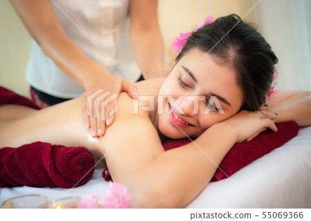 Spa Massage.  Masseur doing massage  55069366