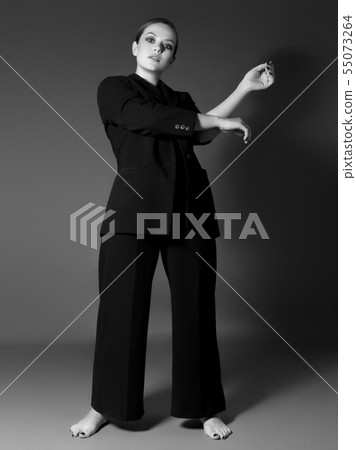 Beauty fashion girl with evening makeup . Black 55073264
