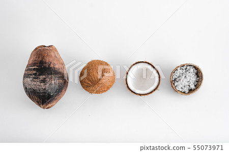 Close-Up Of Coconut Against White Background Close-Up Of Coconut Against White Background 55073971