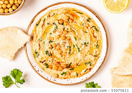 Hummus, chickpea dip, with spices. 55075611