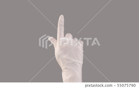 Hand wearing latex gloves gesturing upward on grey Hand wearing latex gloves gesturing upward on grey 55075790