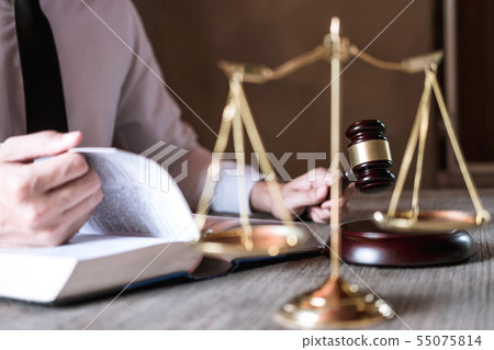 Judge gavel with scales of justice, male lawyers 55075814