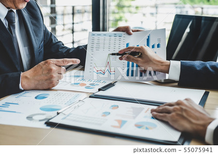 Finance manager meeting discussing company growth Finance manager meeting discussing company growth 55075941
