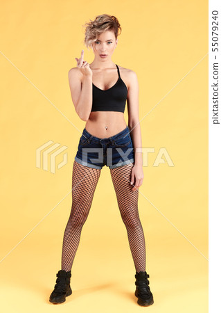 rude girl with bad habit. close up photo. 55079240