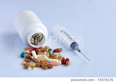 Several different medical pills and capsules Several different medical pills and capsules 55079276