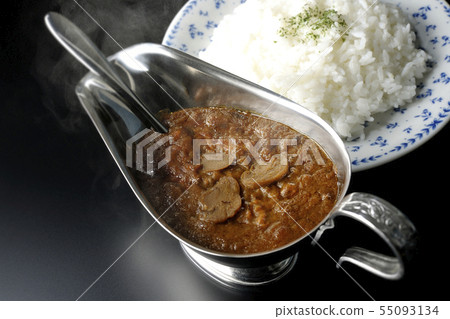 Freshly cooked curry rice Freshly cooked curry rice 55093134