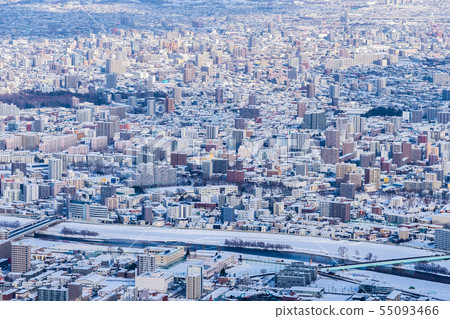 Beautiful architecture building with mountain landscape in winter season Sapporo city Hokkaido Japan 55093466