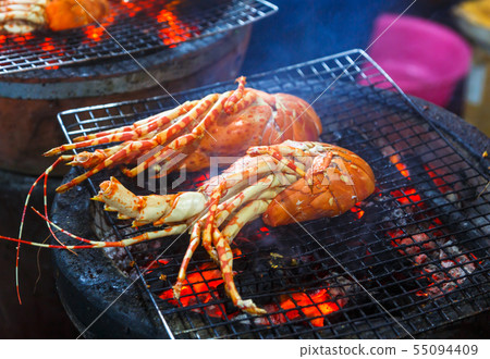 Lobsters are cooked on the grill Lobsters are cooked on the grill 55094409