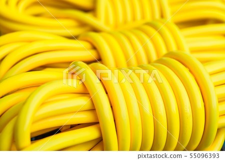close up yellow electric extension cord 55096393