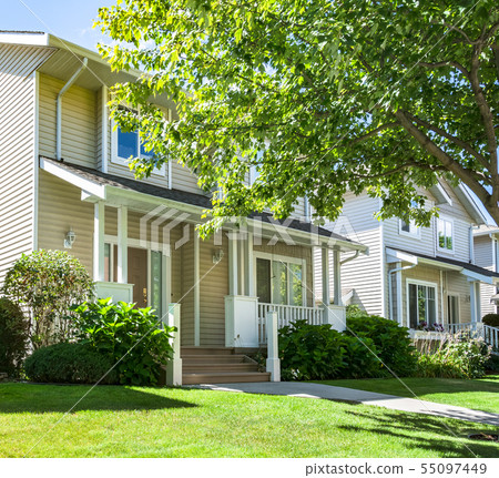 Street of residential houses with concrete Street of residential houses with concrete 55097449