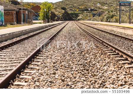 Oxidized railway tracks next to the abandoned Rio Tajo train station, near Garrovillas de Alconetar Oxidized railway tracks next to the abandoned Rio Tajo train station, near Garrovillas de Alconetar 55103496