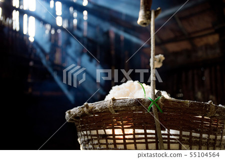 Basket of salt with sunlight. Basket of salt with sunlight. 55104564