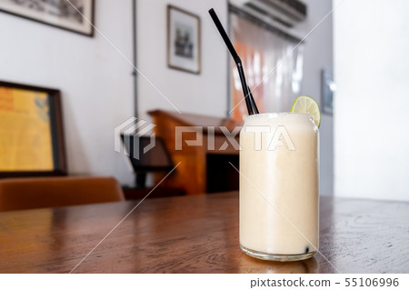 Healthy smoothies on the wooden table in the cafe Healthy smoothies on the wooden table in the cafe 55106996