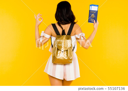Travel concept. Young asian woman holding passport Travel concept. Young asian woman holding passport 55107136