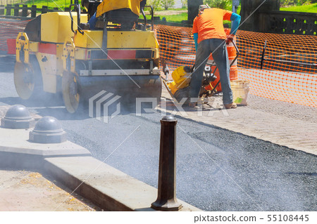 road repairing in urban modern city with heavy 55108445
