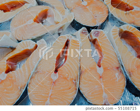 Fresh appetizing raw fish steaks Fresh appetizing raw fish steaks 55108715