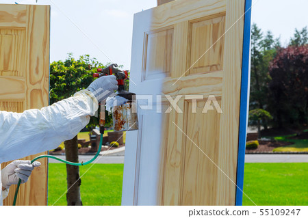 Close-up of spray gun with paint painting Master Close-up of spray gun with paint painting Master 55109247