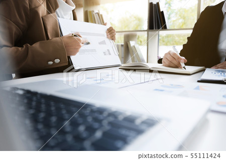 business financier audit working with laptop and business financier audit working with laptop and 55111424