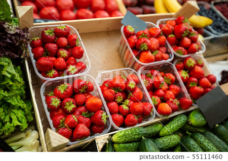 A lot of strawberries in boxes on sale at farms 55111460