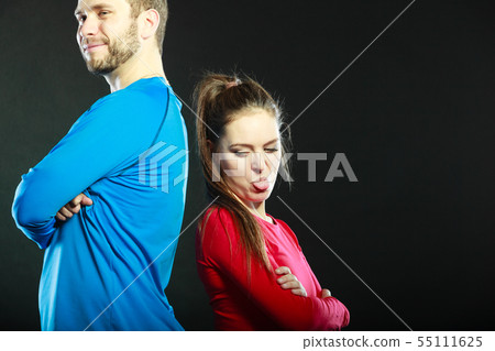 Offended couple back to back. Funny woman. Offended couple back to back. Funny woman. 55111625