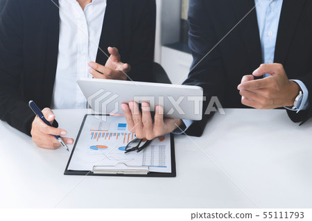 Business executives adviser using digital tablet Business executives adviser using digital tablet 55111793