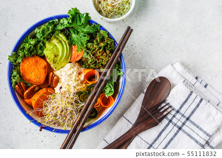 Healthy vegan lunch in white bowl. Buddha bowl 55111832