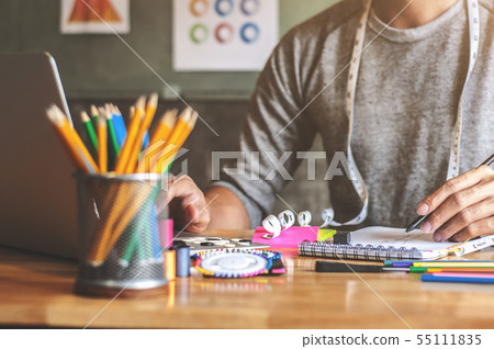 man creative atelier fashion designer working on 55111835