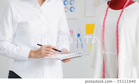 Stylish atelier Fashion Designer work as sketch of 55111840