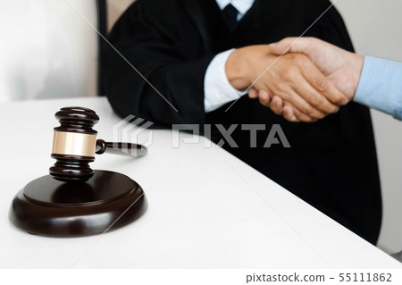 senior lawyer consult with justice hammer hands 55111862